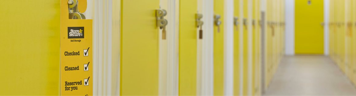 Row of yellow doors for business storage units in Poole facility