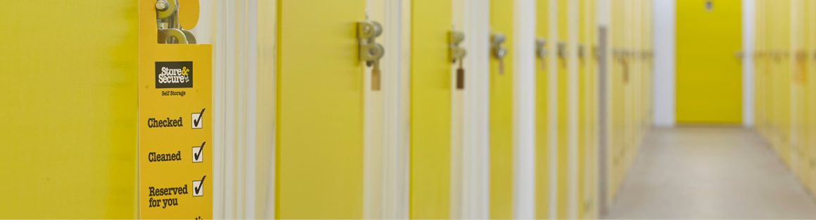 Row of yellow doors for business storage units in Poole facility