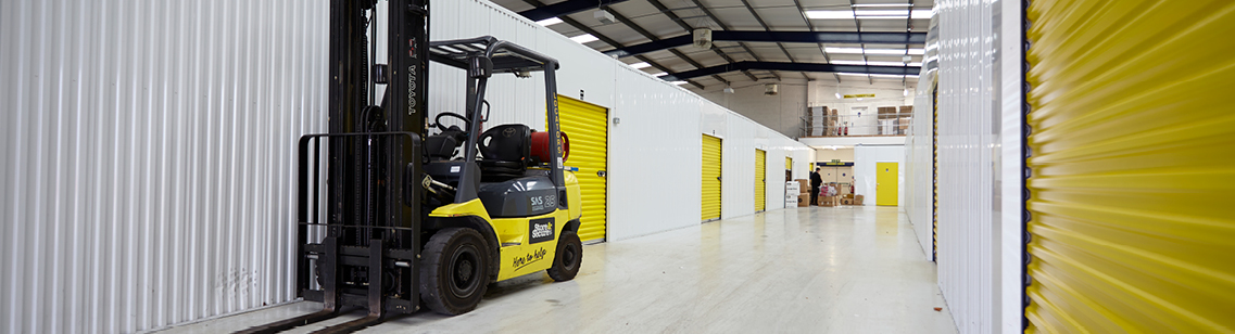 Large DIY Storage units in Poole with yellow doors