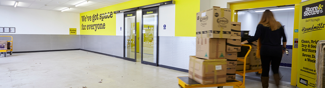 Store & Secure’s heavy-goods lift being loaded with business surplus stock.